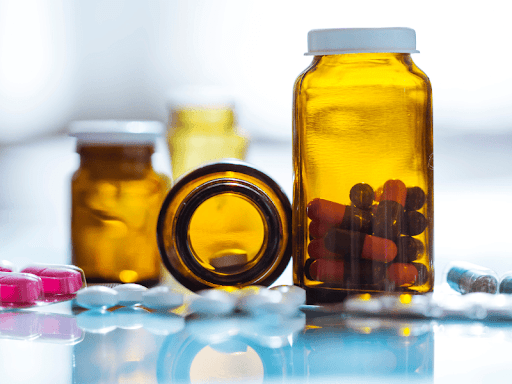 Several pill bottles full of FDA-approved drugs 